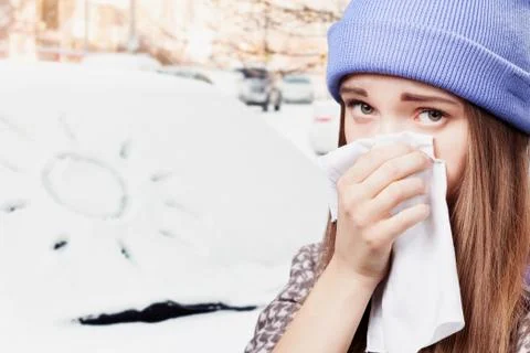 She suffers a cold Stock Photos