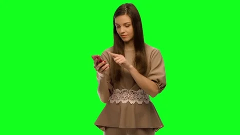 She swears by phone Stock Footage 70364651