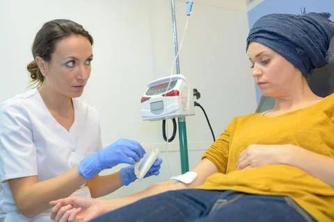 She is taking a blood sample Stock Photos
