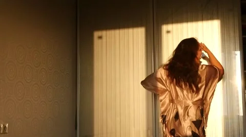 She turns the mirror Stock Footage 68863725