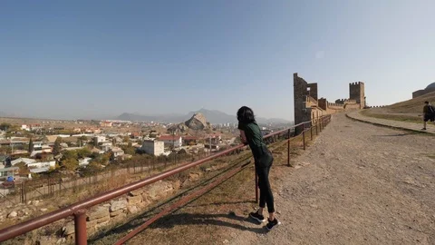 She is on a viewing platform Video stock 103859726