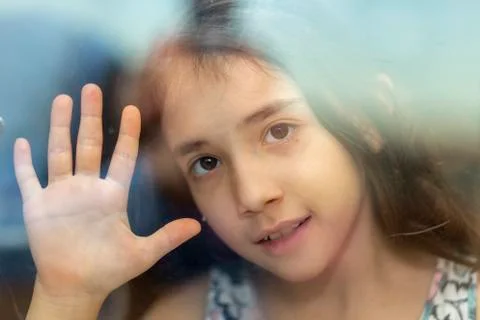 She is waiting for behind the window Stock Photos