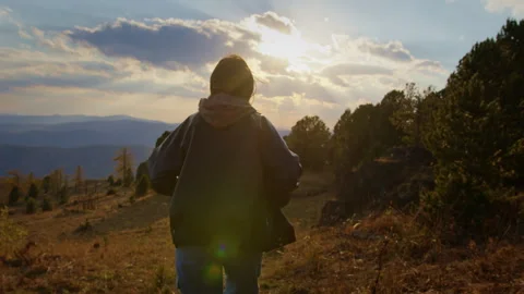 She walking down the hill Stock Footage 288437224