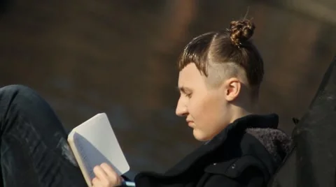 She wrote in a notebook Stock Footage 5165589