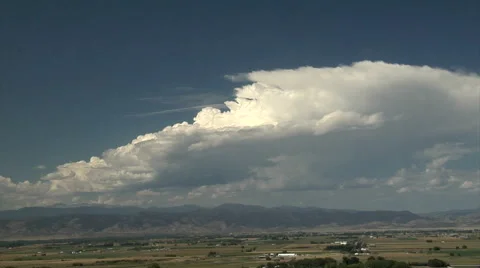 Sheared Thunderstorm Anvils Stock Footage 54759502