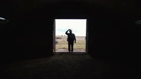 Shed without cattle, sheep, pigs. A distressed man near an empty cattle hangar. Stock-Footage 135870866