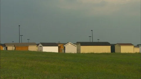 Sheds in a field Stock Footage 87738531
