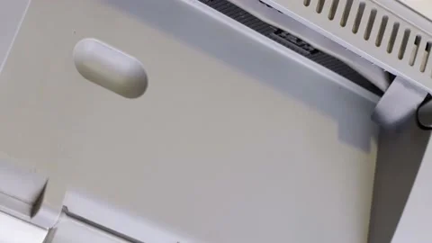 Shedule, office printer prints on a white sheet of paper, close-up, top view, Stock Footage 171658545