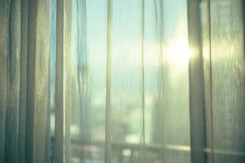 Sheer curtain (translucent fabric) and balcony from high rise condominium Stock Photos