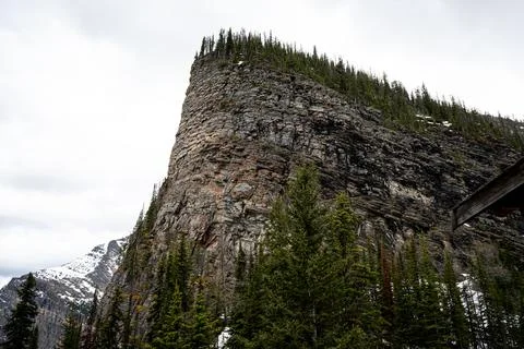 Sheer rock cliff Stock Photos