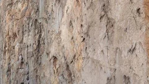 Sheer wall in the mountains broken rock climbers. A place to practice rock Stock Footage 102099229