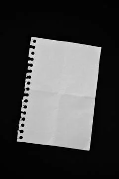 Sheet of blank white paper on black background 스톡 사진