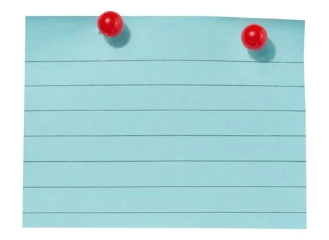 A sheet of blue lined paper attached with two red pushpins on an isolated b.. Stock Photos