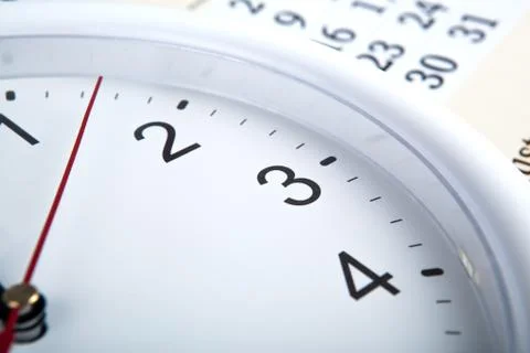 Sheet of a calendar with clockface Stock Photos