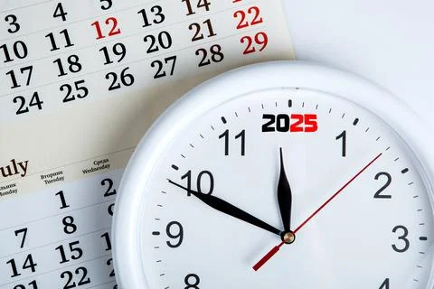 Sheet of a calendar with clockface Foto stock