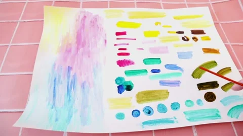 Sheet with examples of watercolor drawings. Show how to paint correctly Stock Footage 219554246