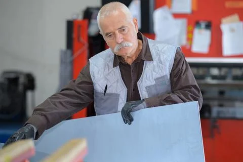 Sheet fabrication worker Stock Photos