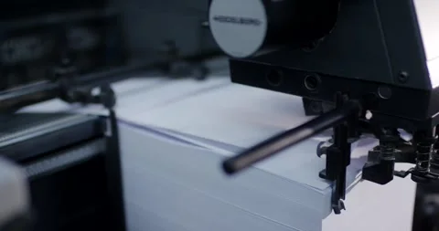 Sheet Feeder Moving Stack of White Paper, Offset Printing Press, Close Up Shot Stock Footage 340364022