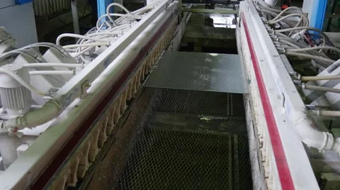 Sheet of Glass in machine for chamfering, glass sheet closeup, making chamfer, Stock Footage 52872470