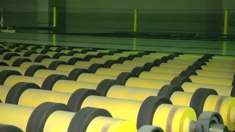 A sheet of glass moves on the roller table Stock Footage 95975898