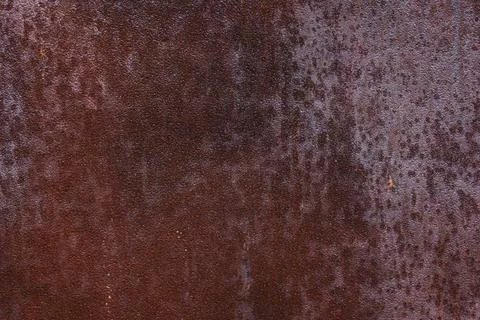 A sheet of iron marred by rust Stock Photos