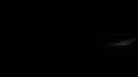 Sheet lightning flashing in the sky over the ocean. Stock Footage 70966567