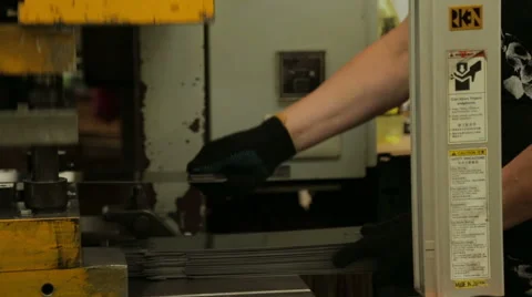 Sheet of metal and hands of worker Stock Footage 63905706