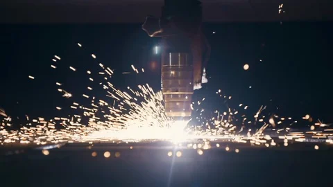 The sheet metal cutting process by CNC laser cutting. Bright sparks, Close up Video stock 127652084