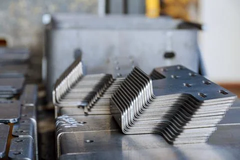 Sheet metal product after processing on a bending machine. Production of fast Stock Photos