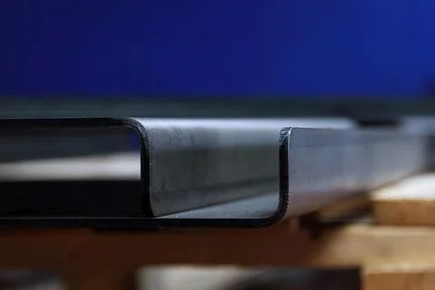 Sheet metal product after processing on a bending machine. Precise bending of Stock Photos