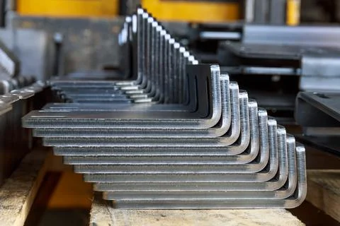 Sheet metal product after processing on a bending machine. Stock Photos