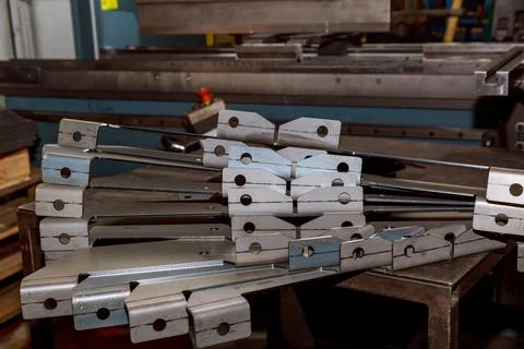 Sheet metal product after processing on a bending machine. Stock Photos