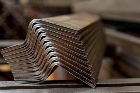 Sheet metal product after processing on a bending machine. Stock Photos