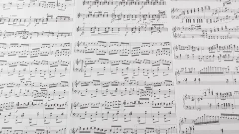 Sheet music which is ideal for background Stock Footage 236699656