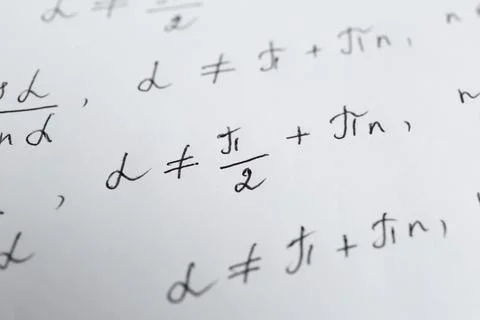 Sheet of paper with different mathematical formulas, closeup Fotos de archivo