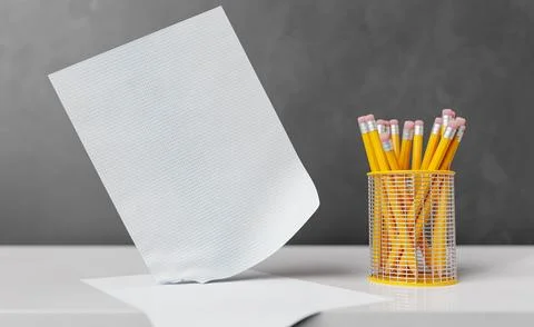 Sheet of paper falling on table near pencils Stock Illustration