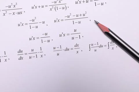 Sheet of paper with mathematical formulas and pencil, top view Fotos de archivo