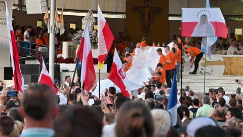Sheet of prayers being brought to the altar during Mladifest in Medjugorje. Stock Footage 205828526