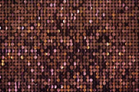 Sheet of shiny red discs for use as an abstract background texture Foto stock