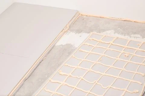 Sheet of styrofoam in glue on floor Stock Photos
