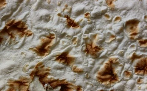 Sheet of thin pita bread for wrapping meat for shawarma or taco cooking Foto stock