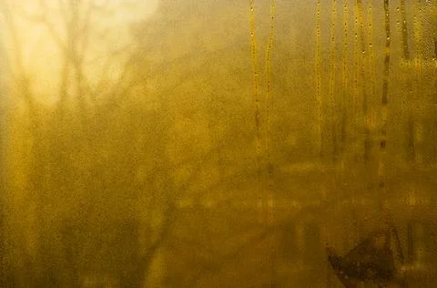 Sheet of transparent window covered in moisture. wet glass background. Fogg.. Stock Photos
