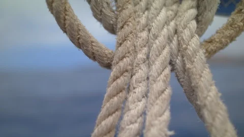 Sheet weighs on Bow Pullpit Yacht  with Fishermen floats on water for luck 스톡 동영상 113385163