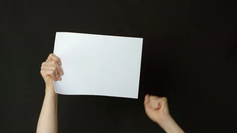 A sheet of white paper is held by a protester in China. Stock Footage 223184744