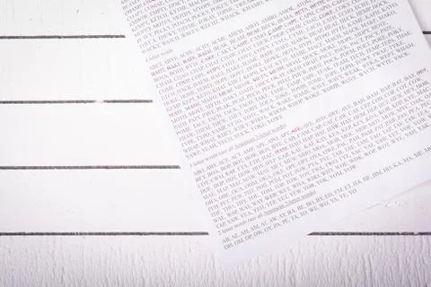 Sheet with words from entertaining game, sorted by number of letters. Stock Photos