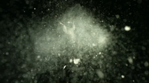 Sheetrock explosion, black background, slow motion Stock Footage