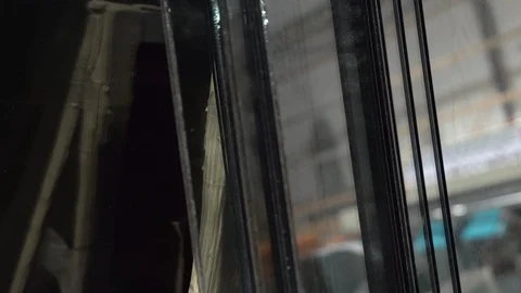 Sheets of black tempered glass. Stack of huge black glass panels in the Stock Footage 124060730