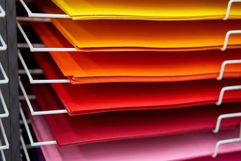 Sheets colored cardboard for designer creative works. Stacks multicolored dra Foto stock