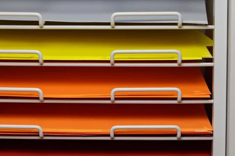 Sheets colored cardboard for designer creative works in the store Stock Photos