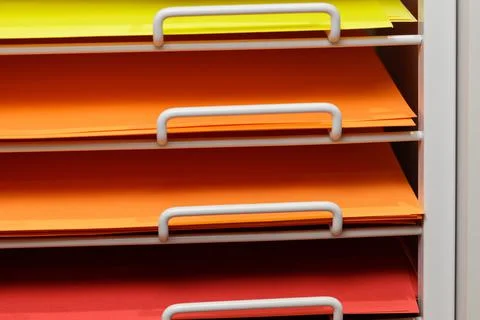 Sheets colored cardboard for designer creative works in the store. Close up Stock Photos
